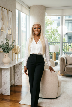 Woman wearing long straight platinum blonde lace front wig with natural hairline